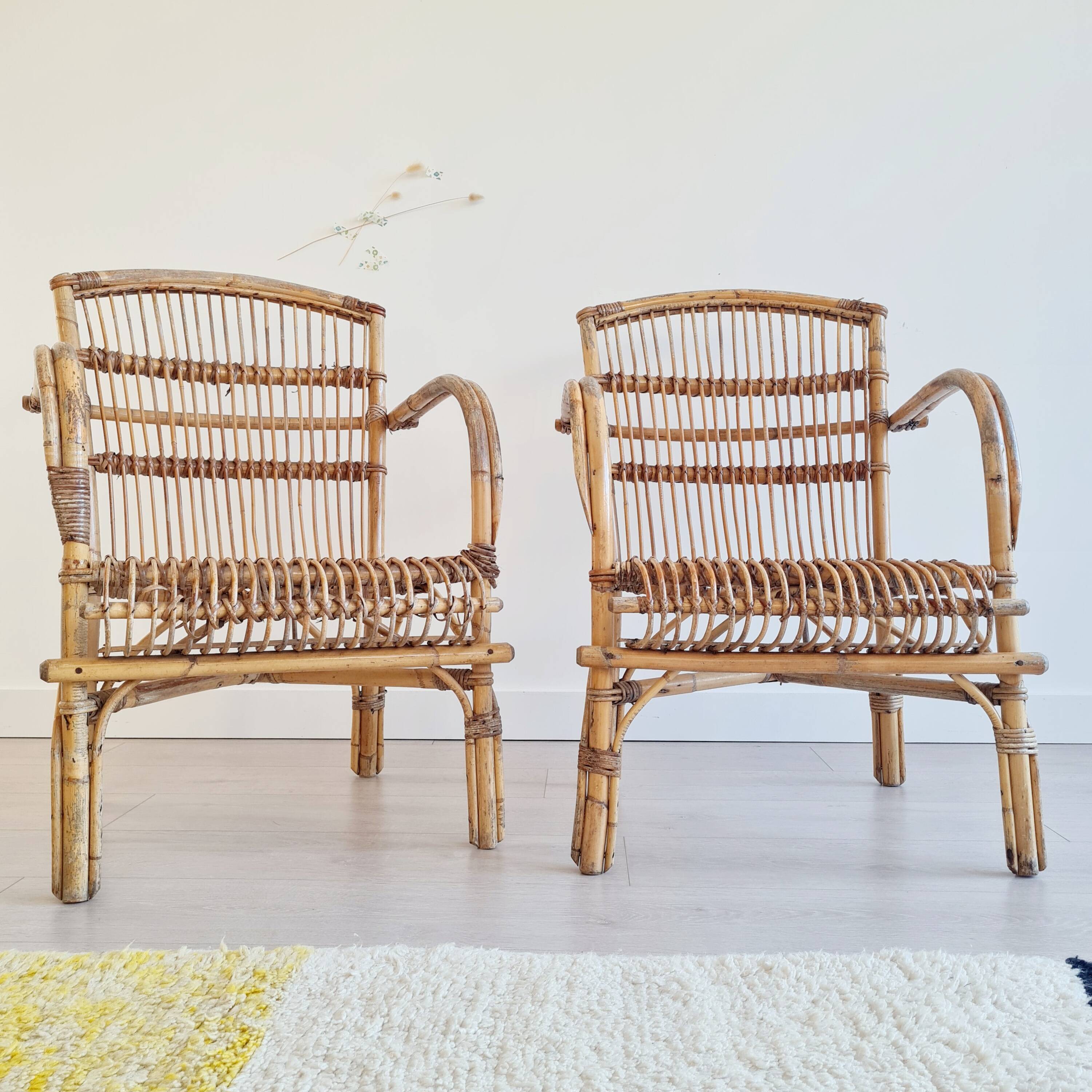 Paire de fauteuils anciens en rotin