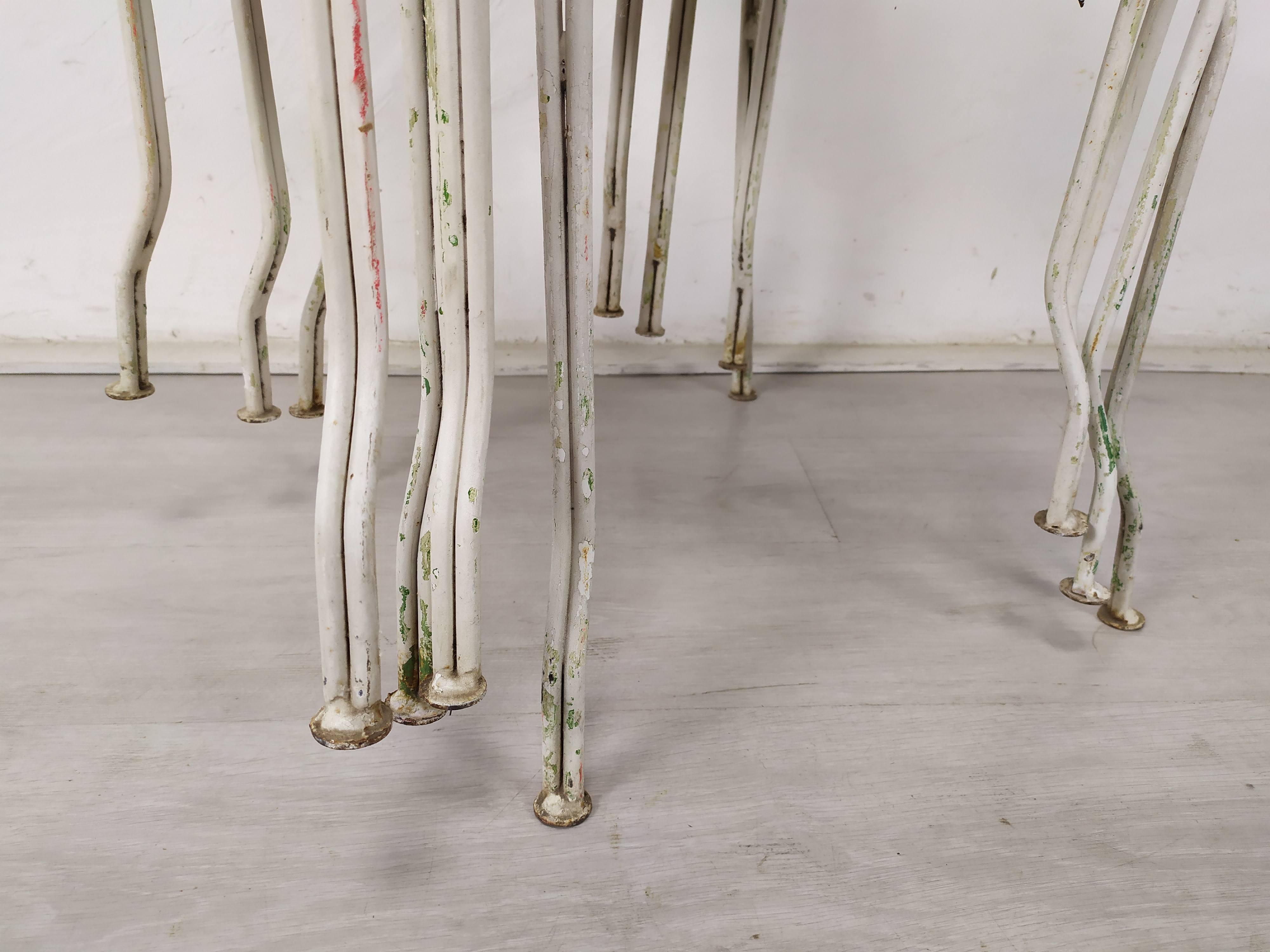 4 wrought iron garden armchairs