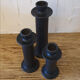 Set of three candlesticks in black tadelakt