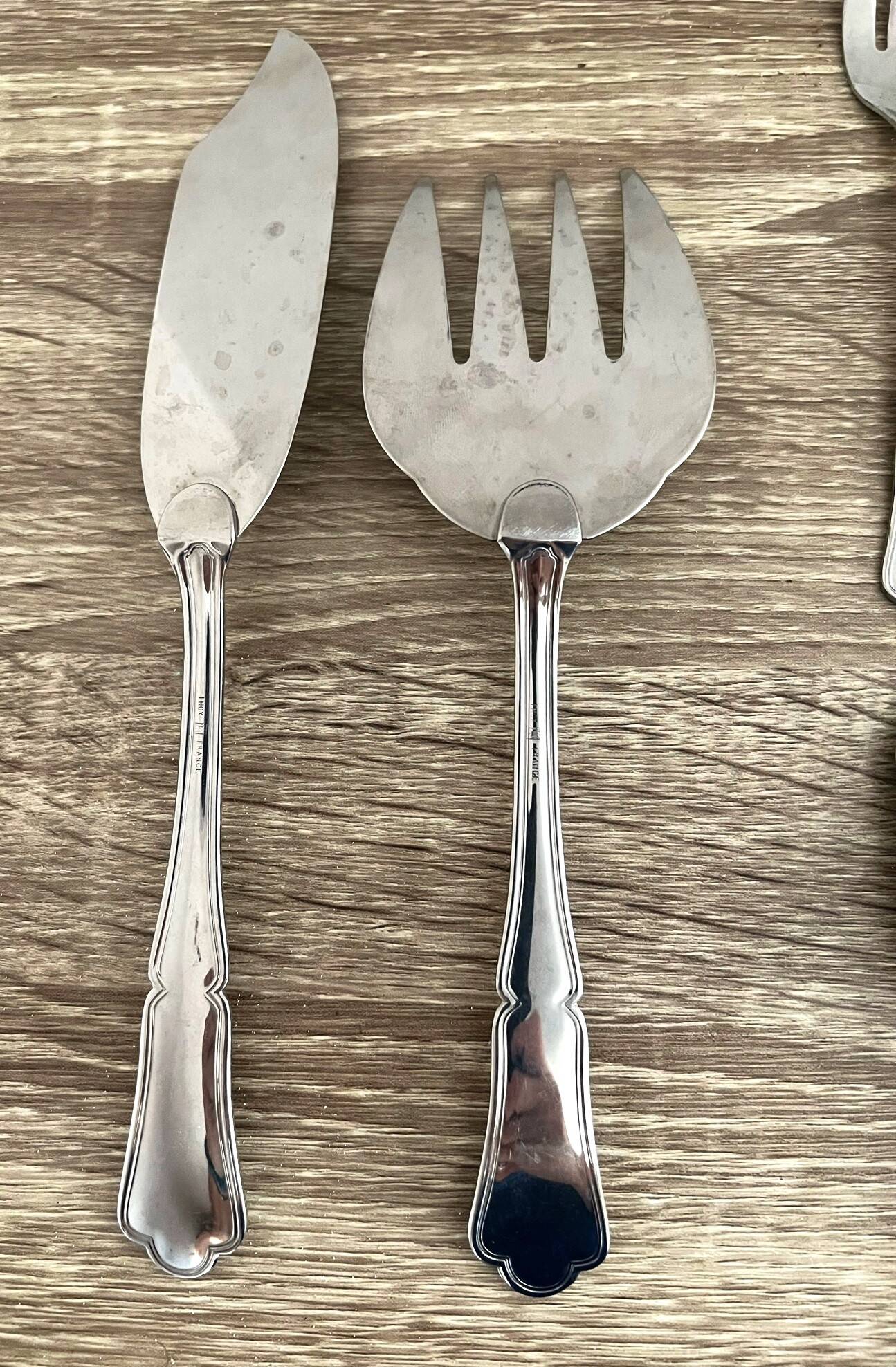 14 fish cutlery sets, 6 forks, 6 knives, 2 stainless steel serving cutlery sets