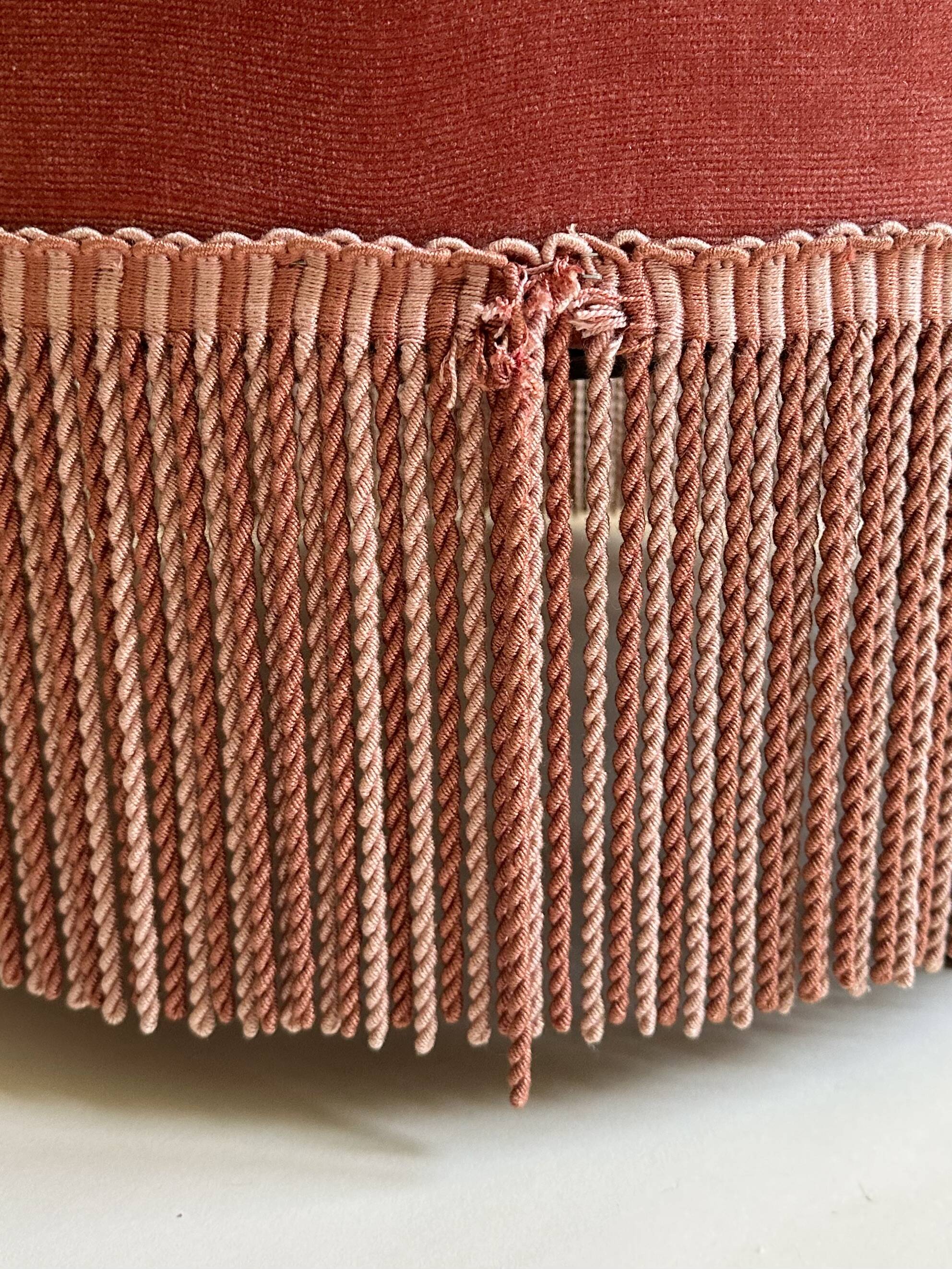 Pink-orange velvet tub chair