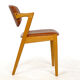 Four Kai Kristiansen oak chairs with new leather upholstery