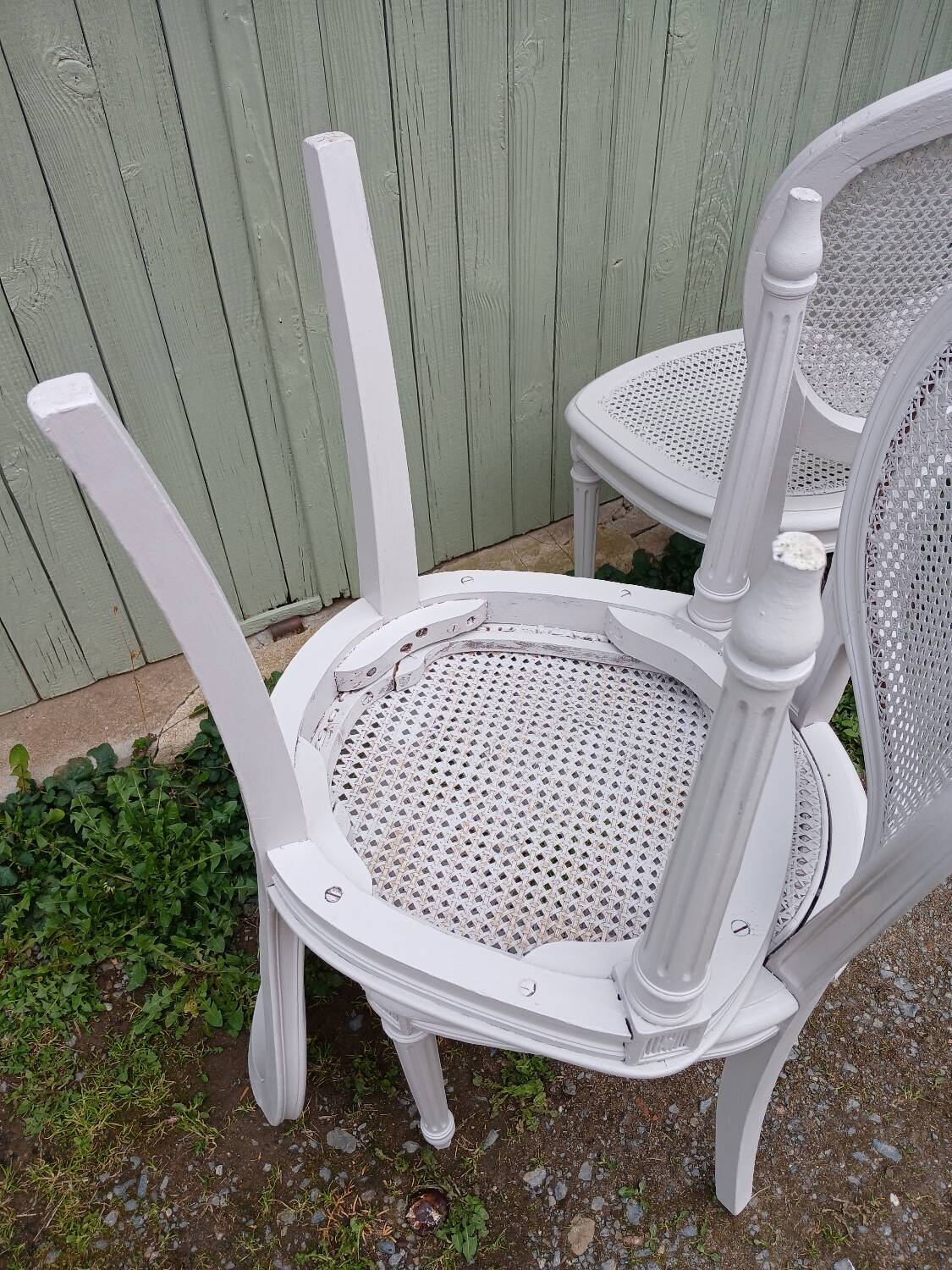 4 old wooden and cane chairs