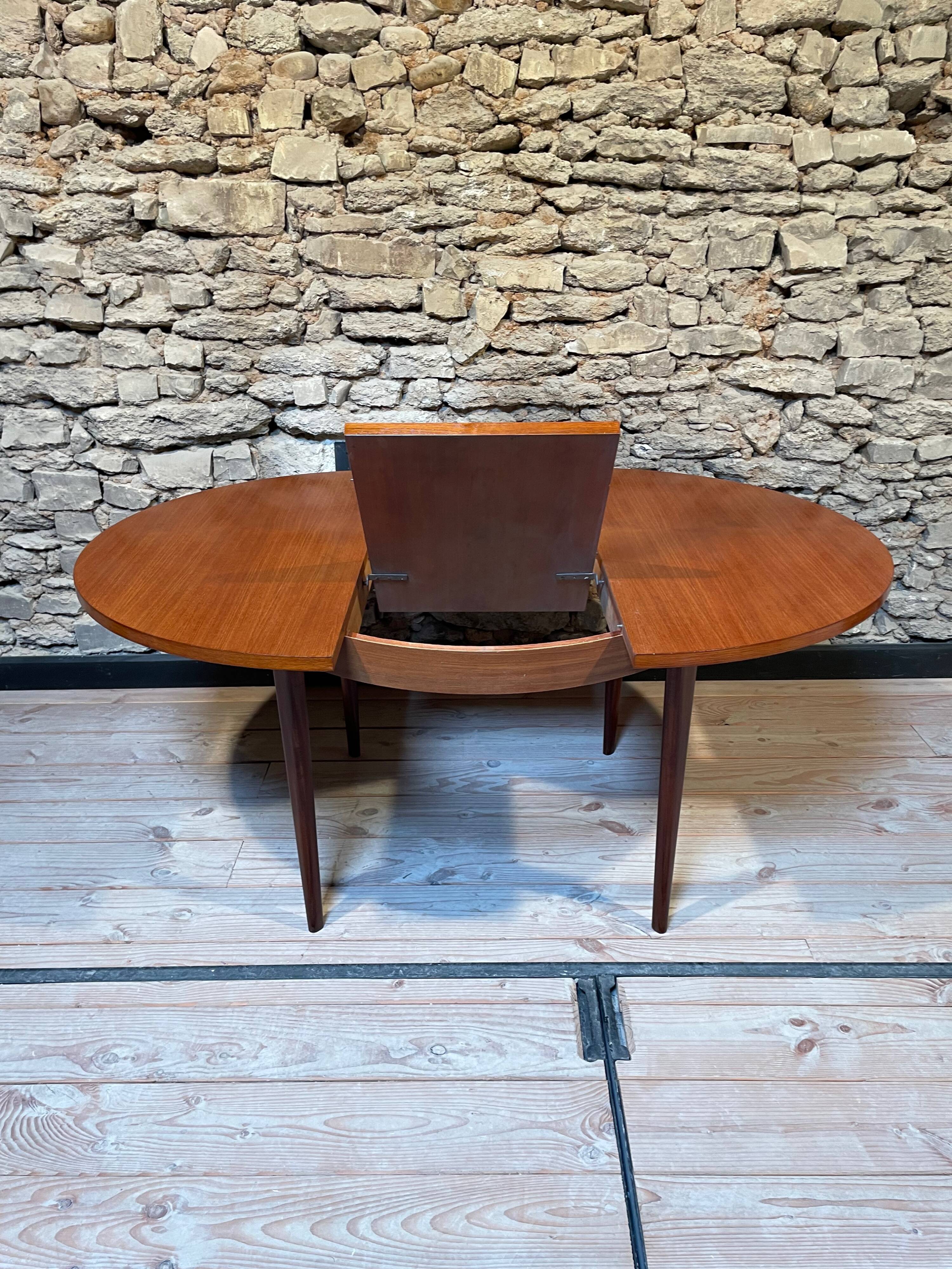 Teak table, vintage Scandinavian style from the 1960s, with hidden extension