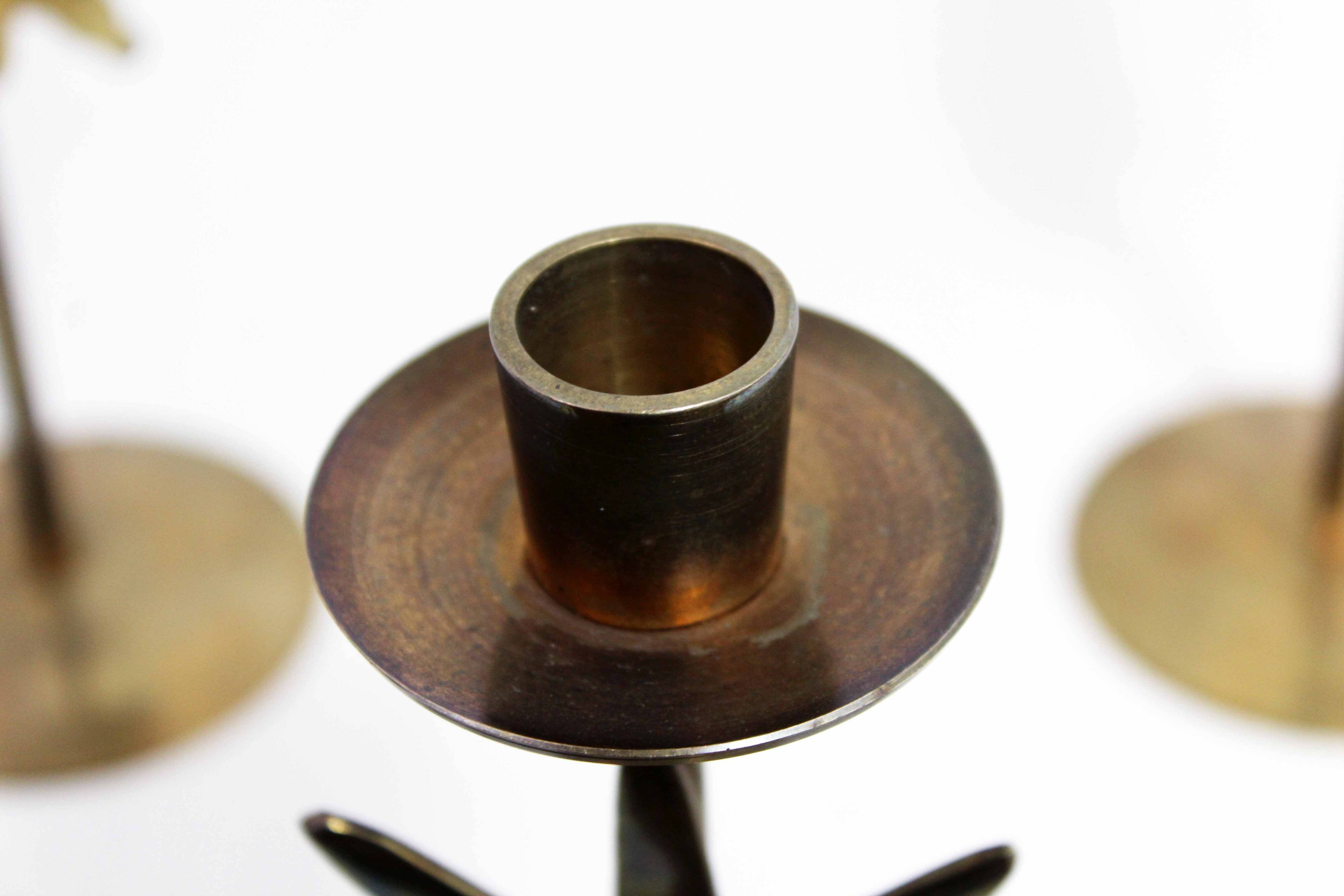 Set of 3 brass sun candle holders