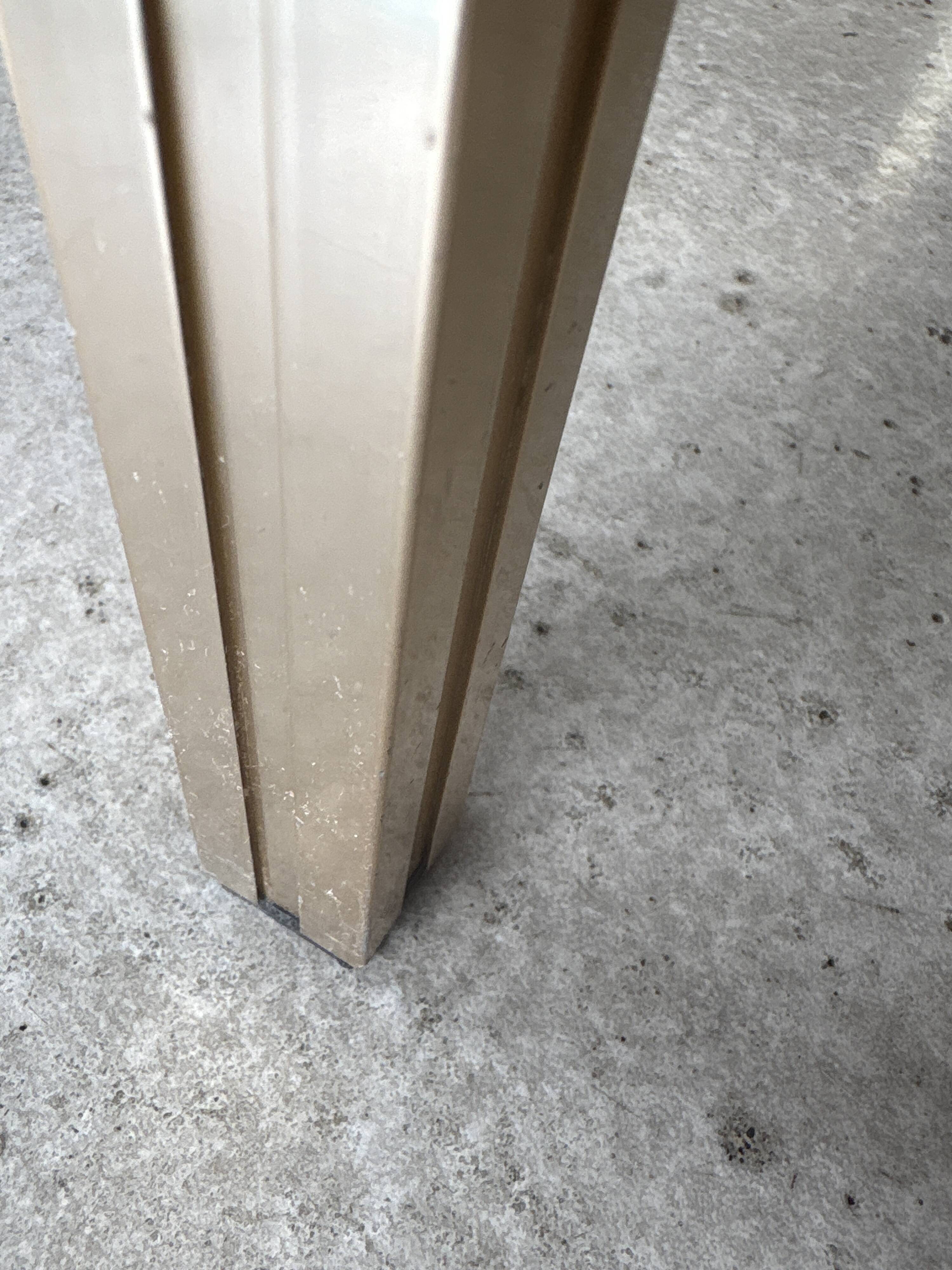 Brass/glass table designed by Pierre Vandel Paris