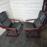 Pair of Scandinavian armchairs in leather and curved wood