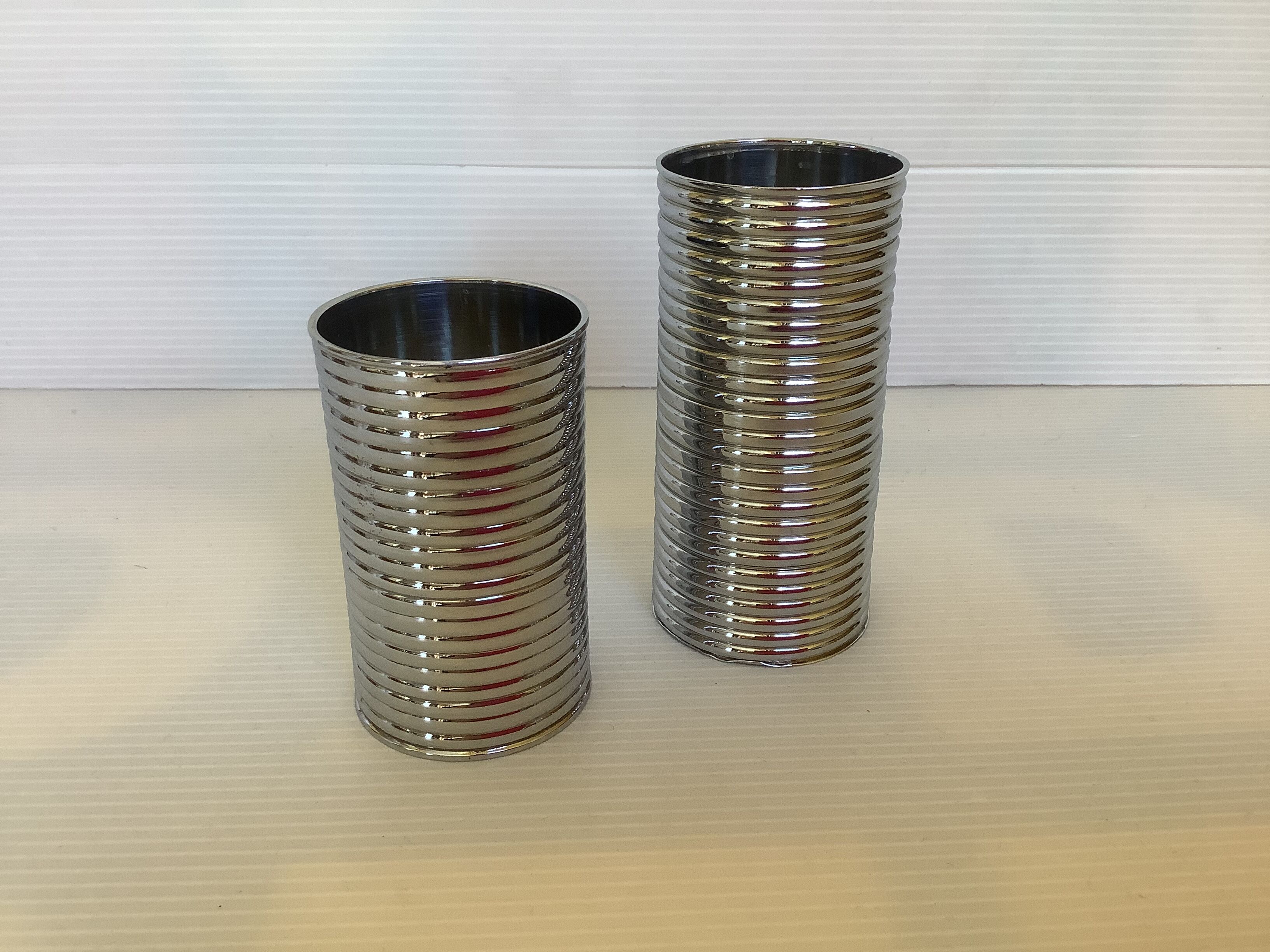 Pair of chrome-plated metal roller holders