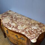 Louis XV style commode with floral marquetry decoration.