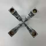 A chromed metal candle-holder "Chorus", design Karim Rashid, executed by Umbra / USA 2002