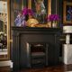 Luxury electric fireplace and classic black mantel suite