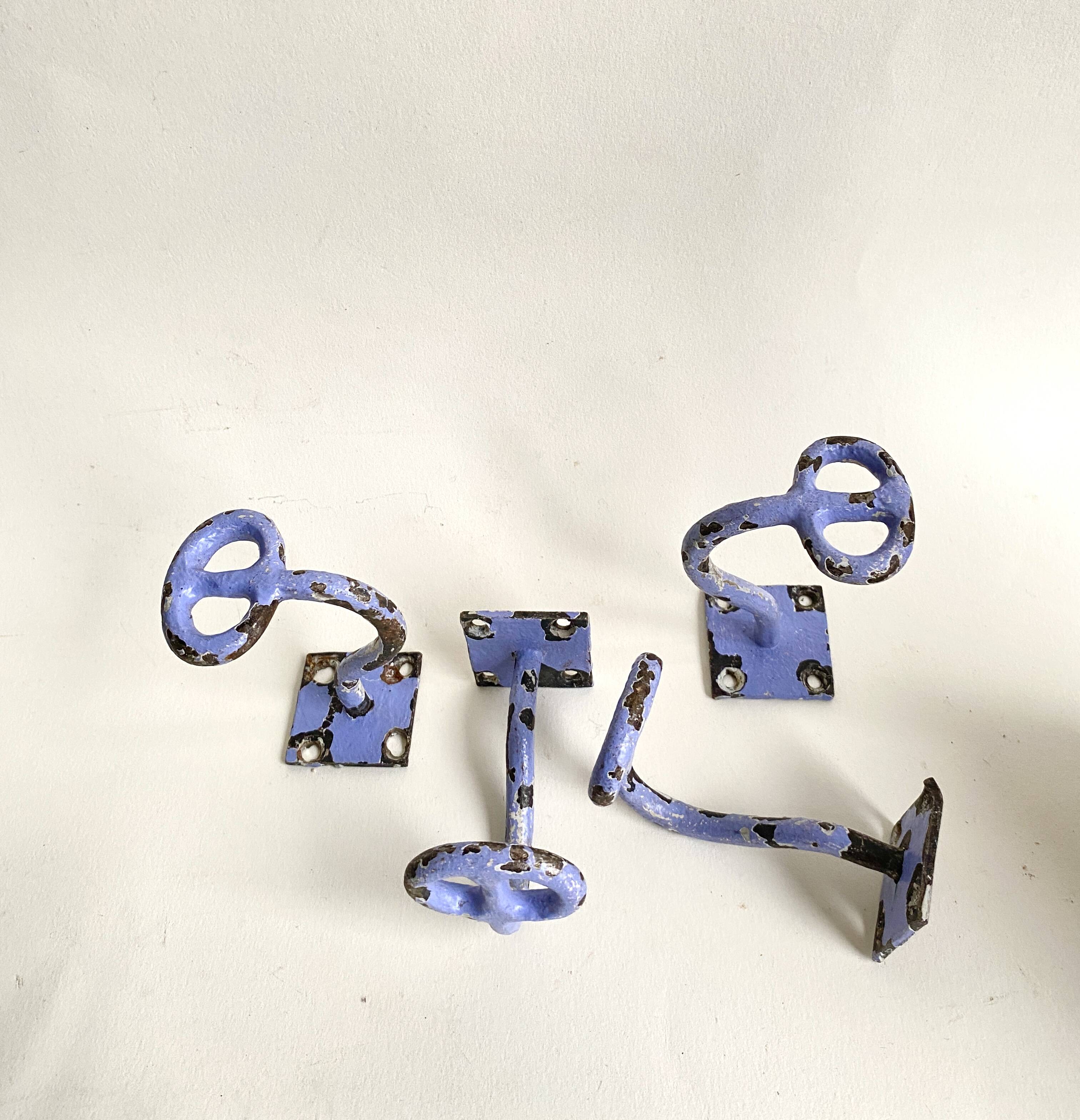 Set of painted cast iron industrial coat hooks