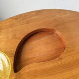 Tables basses en orme formant une goutte