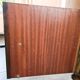 Dark wood sideboard with brass finishes and compass feet