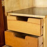 Pair of mahogany veneer and black lacquered iron cabinets. 1950s.