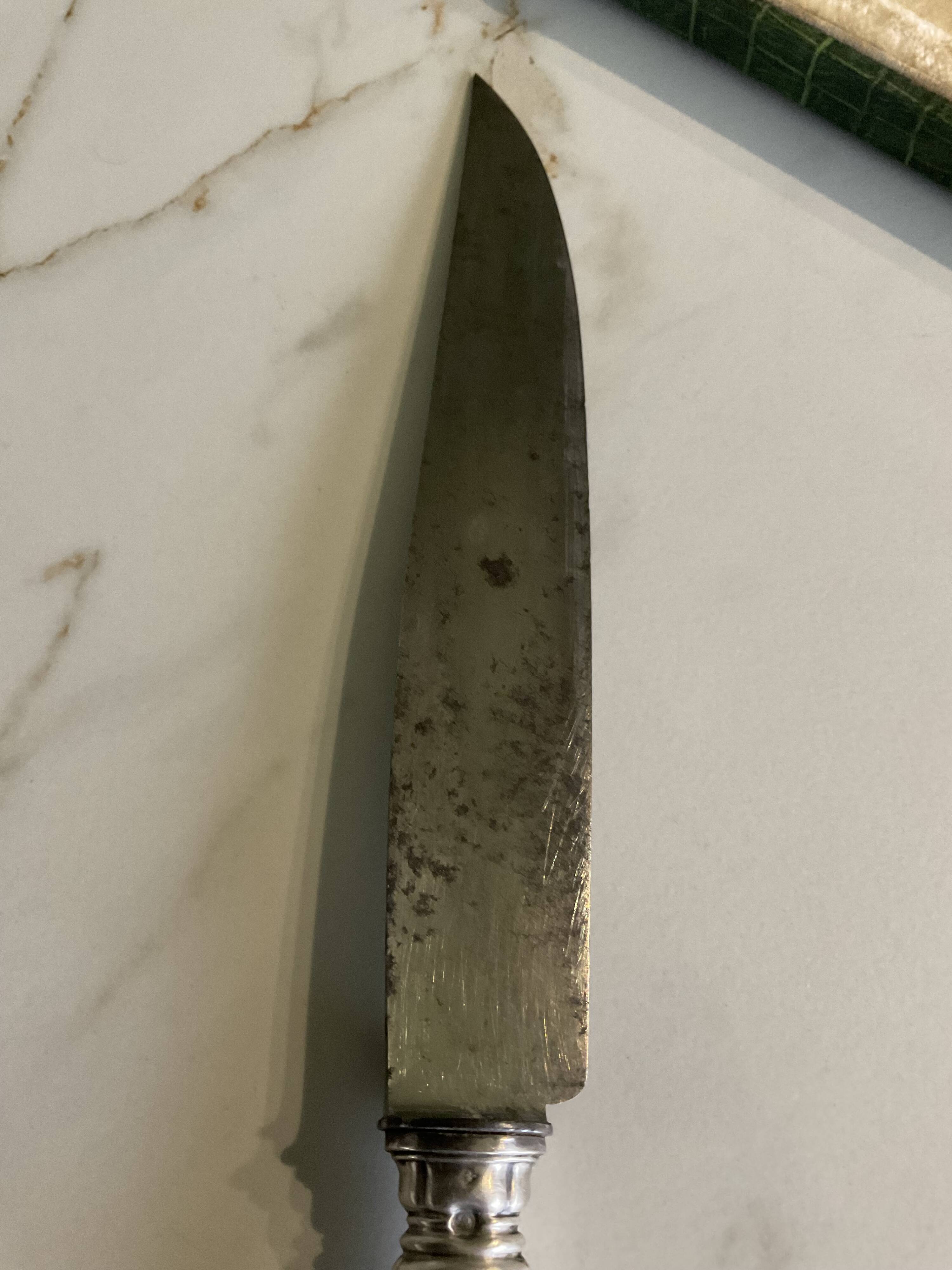 Leg cutlery set. Silver handles.