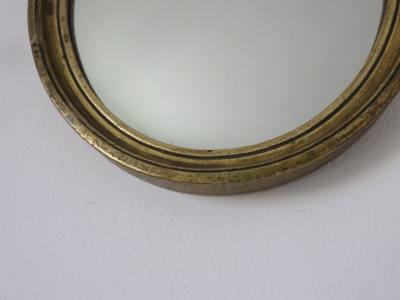 Old oval mirror in gilded wood 50s 60s