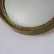 Old oval mirror in gilded wood 50s 60s