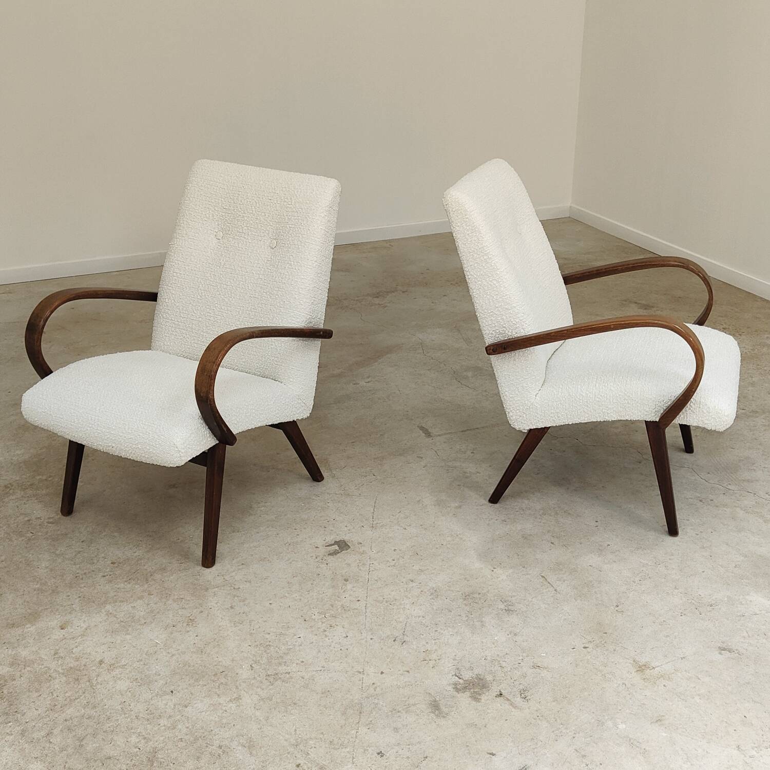 Pair of Jaroslav Smidek armchairs for Ton Bystrice, restored with white boucle, 1960.