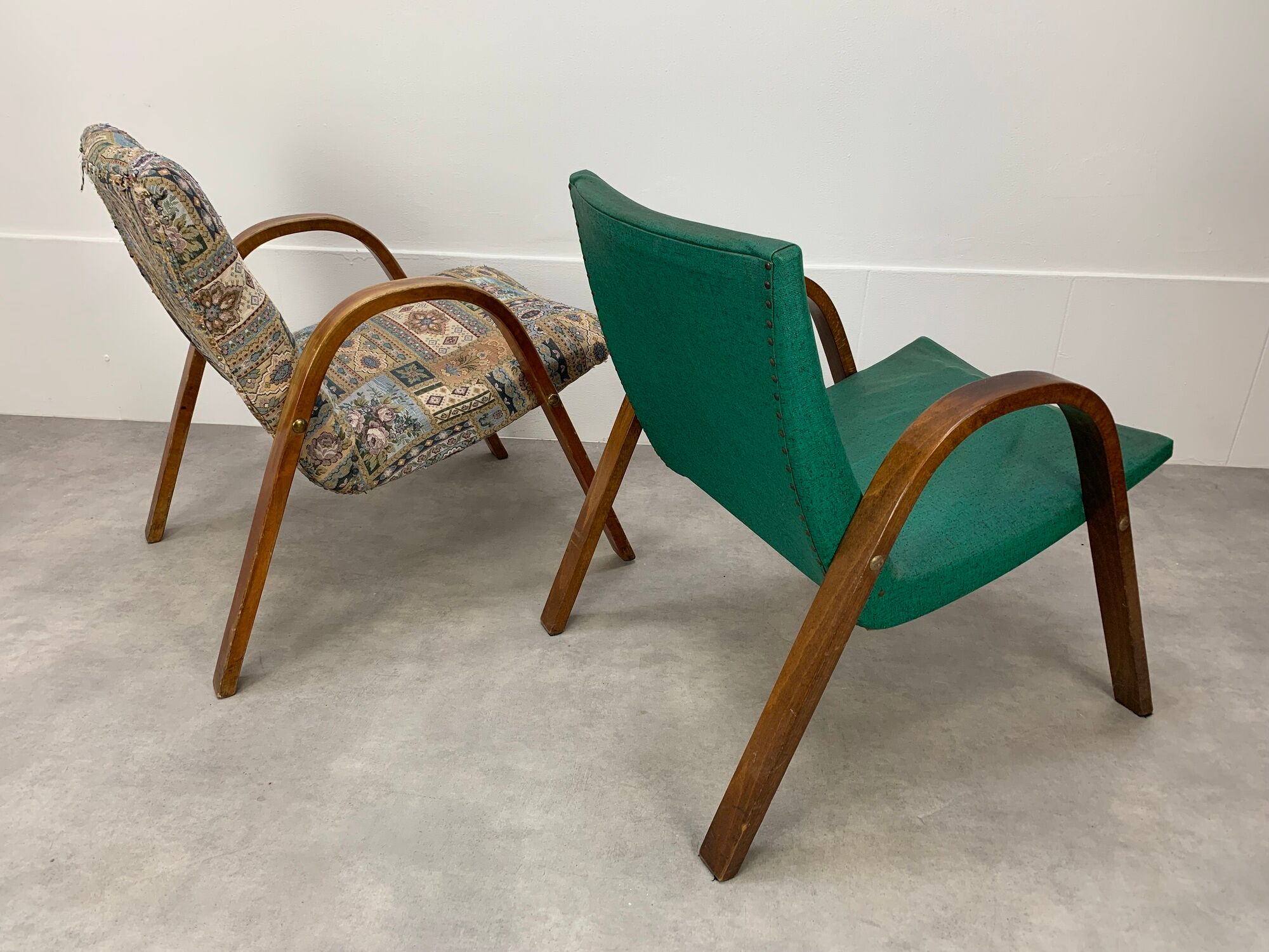Pair of Bow Wood Hugues Steiner armchairs for Baumann