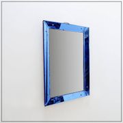 Mirror with coloured glass frame, Italy, circa 1950.