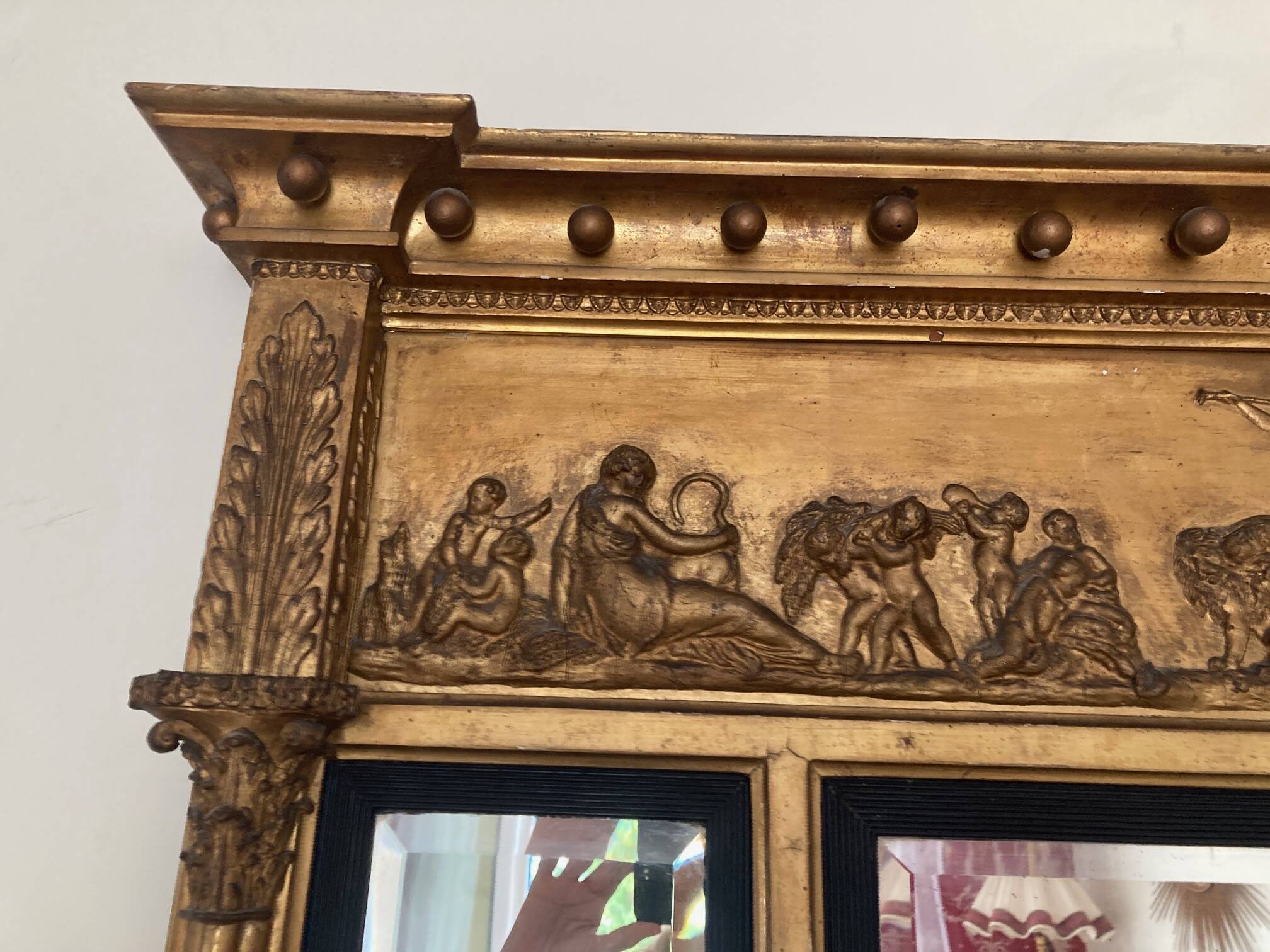 Empire style triptych mirror in gilded wood