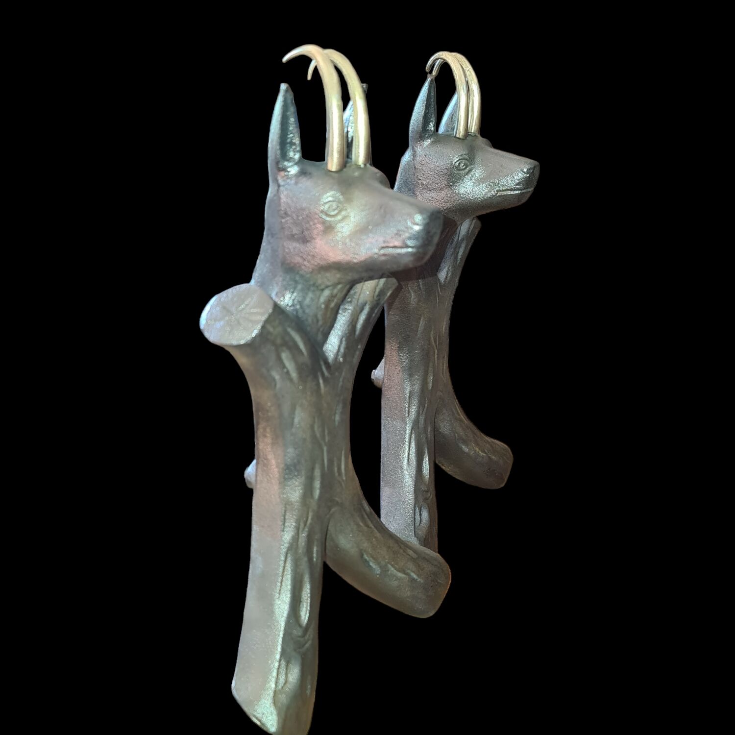 Zoomorphic buff brass and cast iron andirons