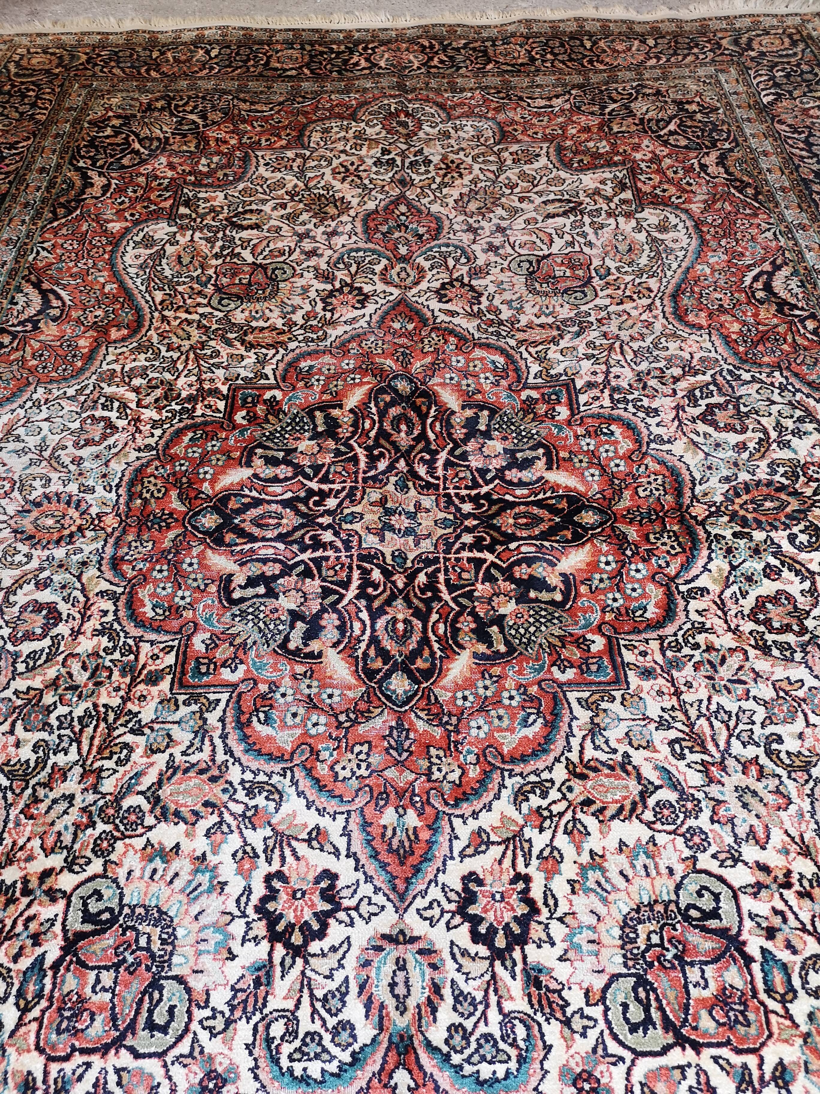 Ancient Indian silk carpet and wool
