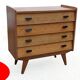 Vintage commode from the 1960s with tapered legs.