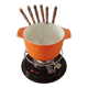 Nomar fondue service in orange cast iron