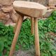Antique stool in raw wood