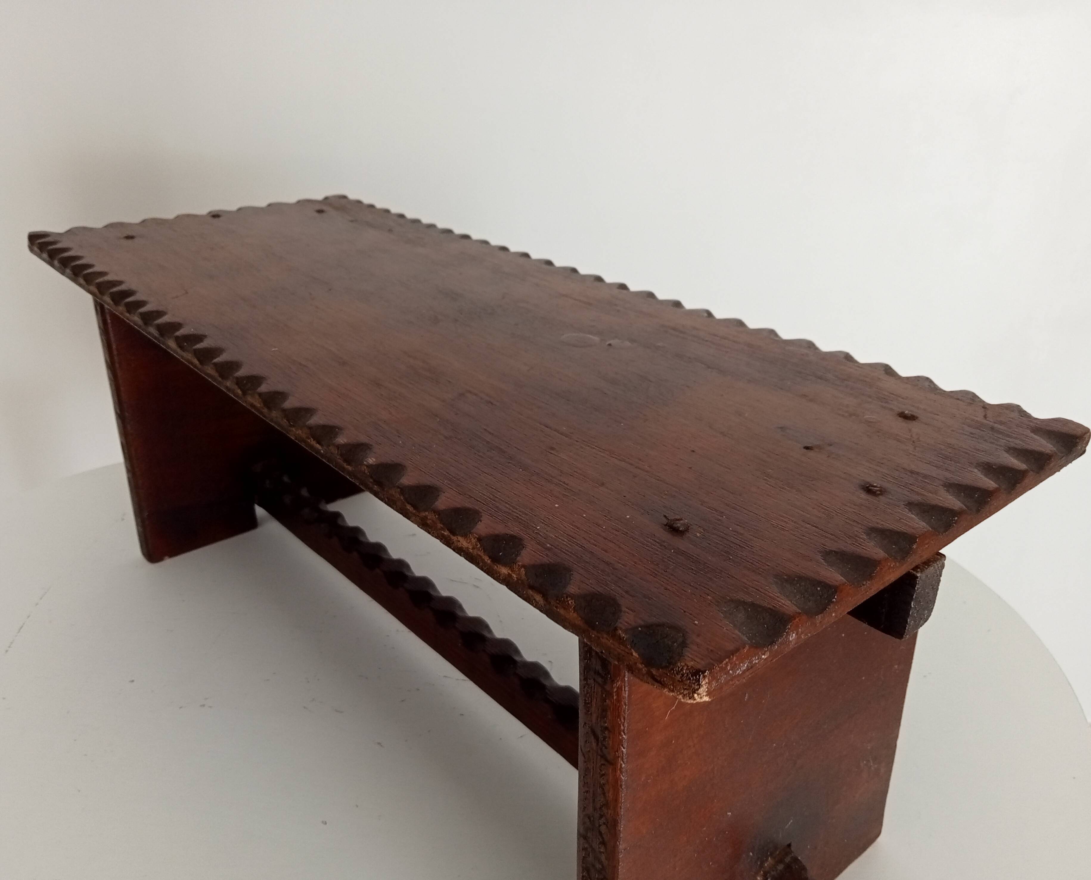Low brutalist stool in the style of Charles Dudouyt.
