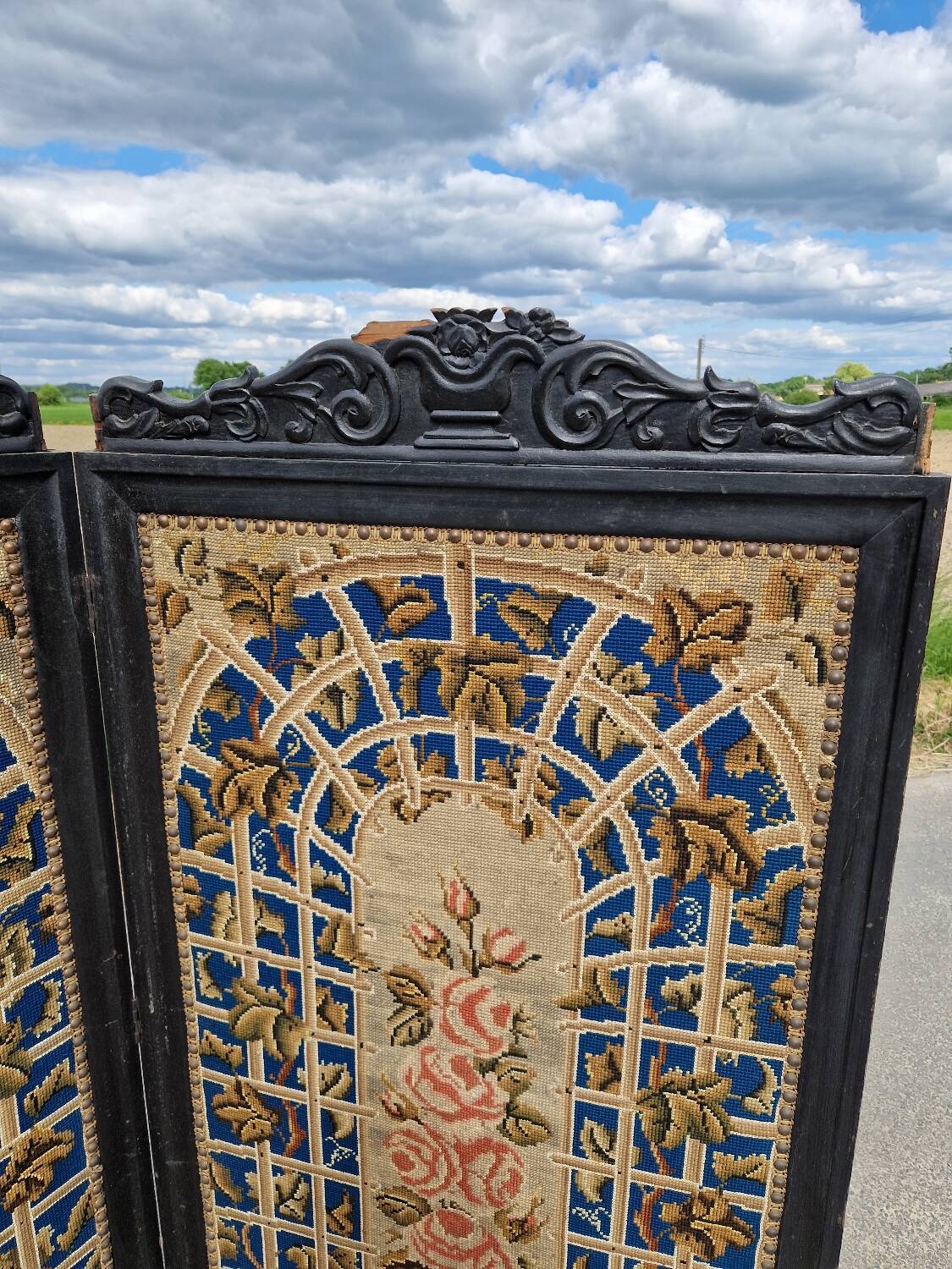 Folding screen in black-painted wood, 19th century