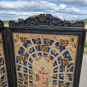 Folding screen in black-painted wood, 19th century
