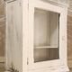 Glazed wall-mounted medicine cabinet in patinated wood