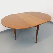 Round dining table in vintage Scandinavian style from the 50s and 60s in teak.