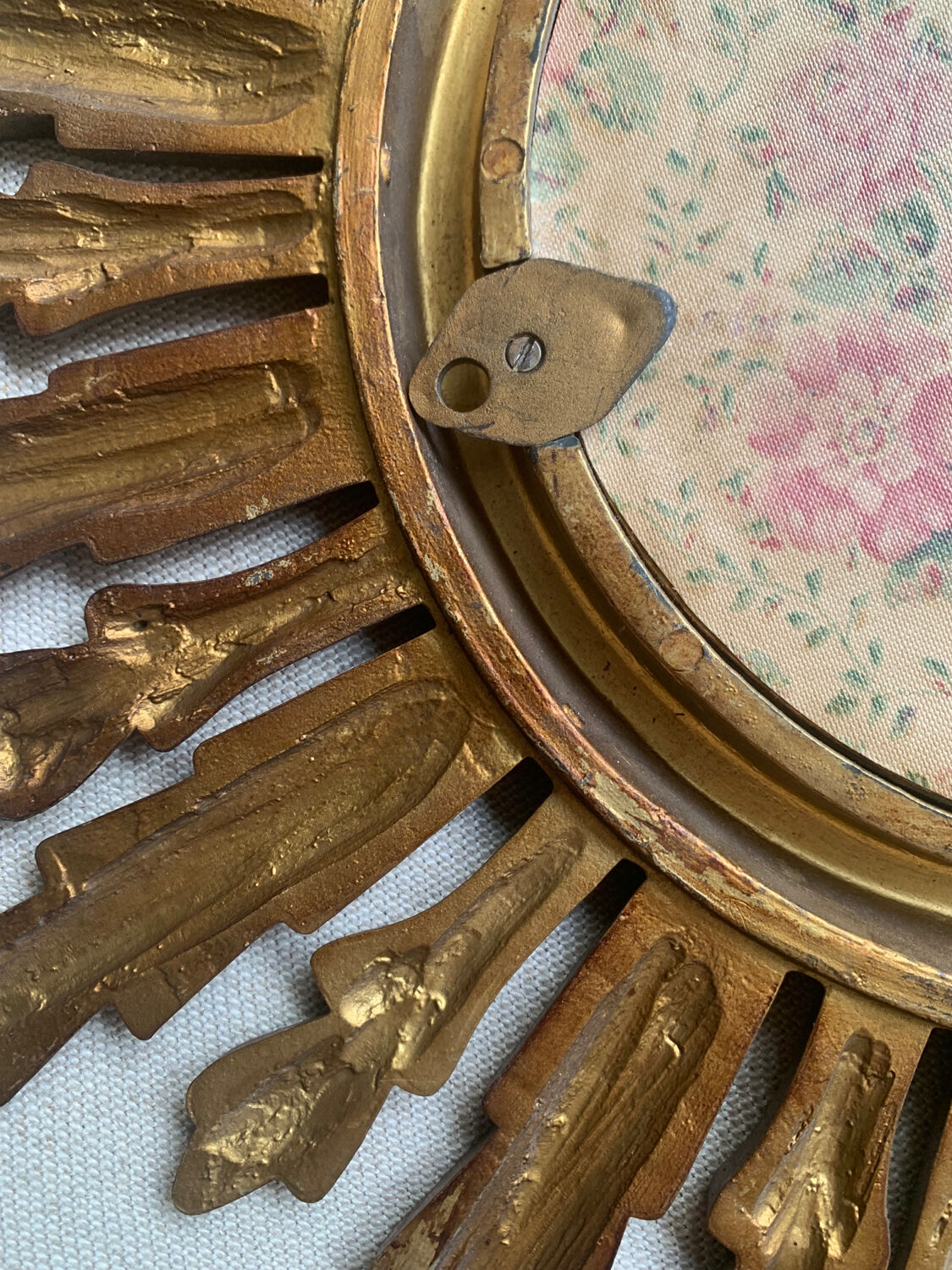 Sun mirror in old wood