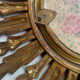 Sun mirror in old wood