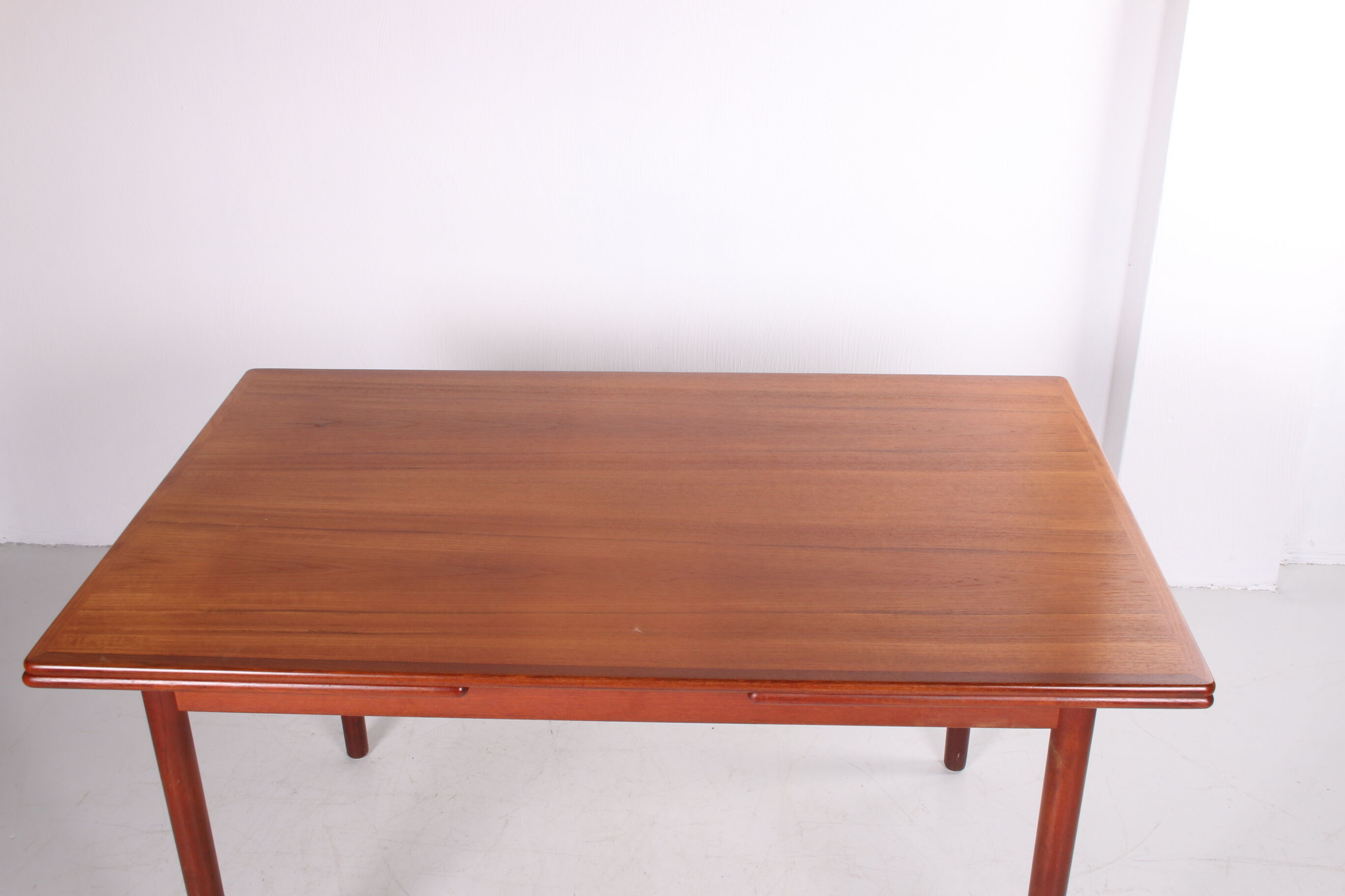 Danish teak draw-leaf dining table