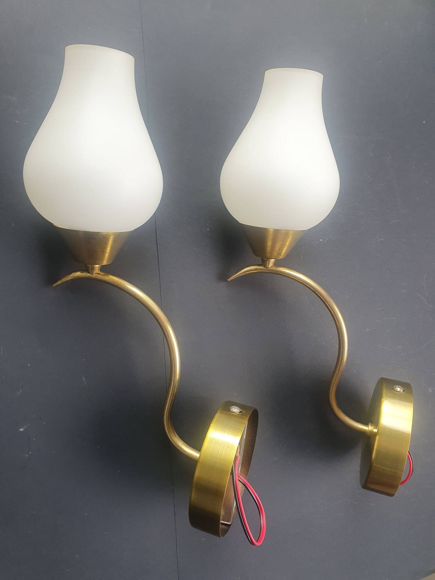 Pair of vintage wall sconces in gilded brass and opaline glass from the 1950s.