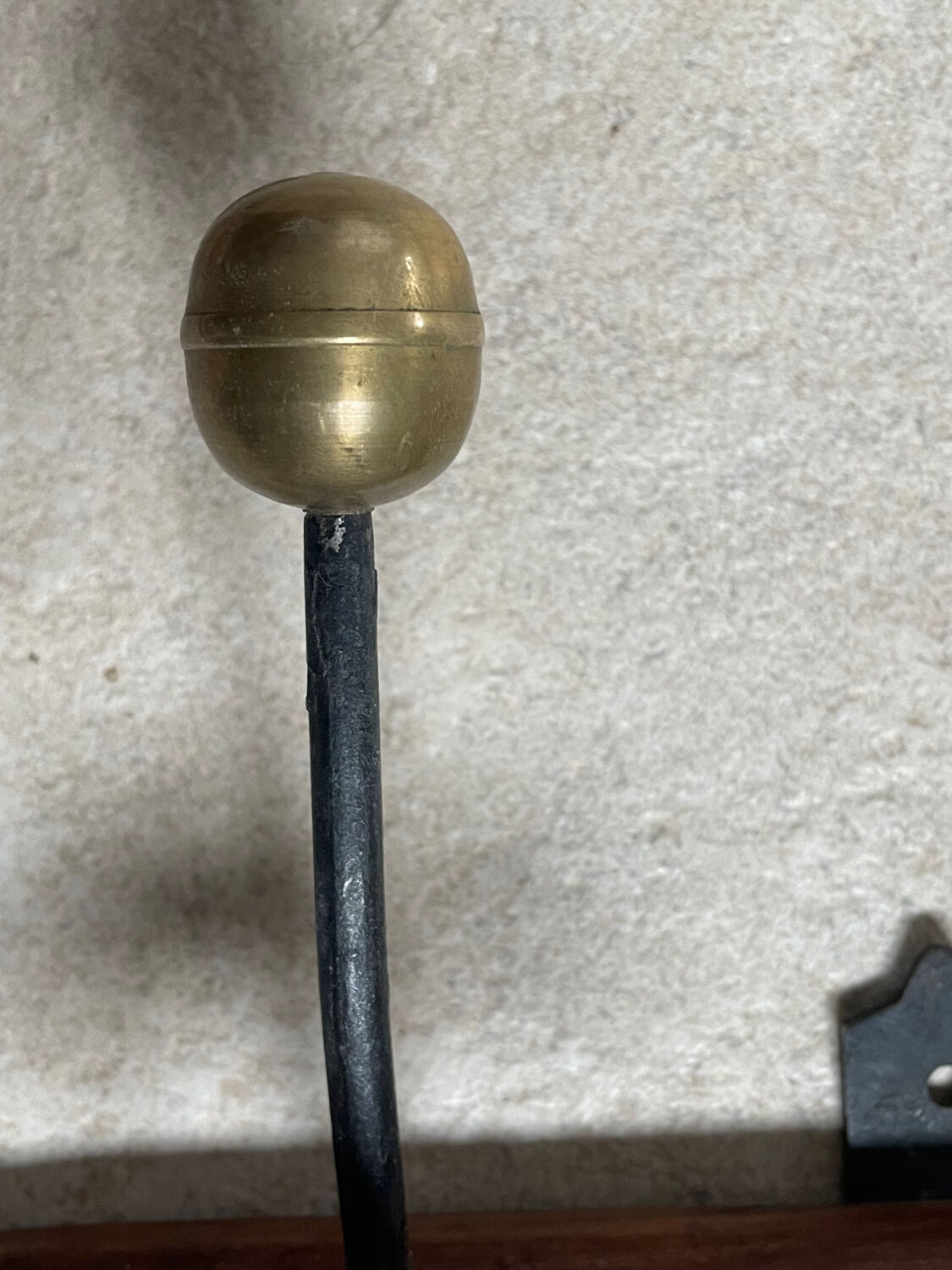 Wood and brass coat rack