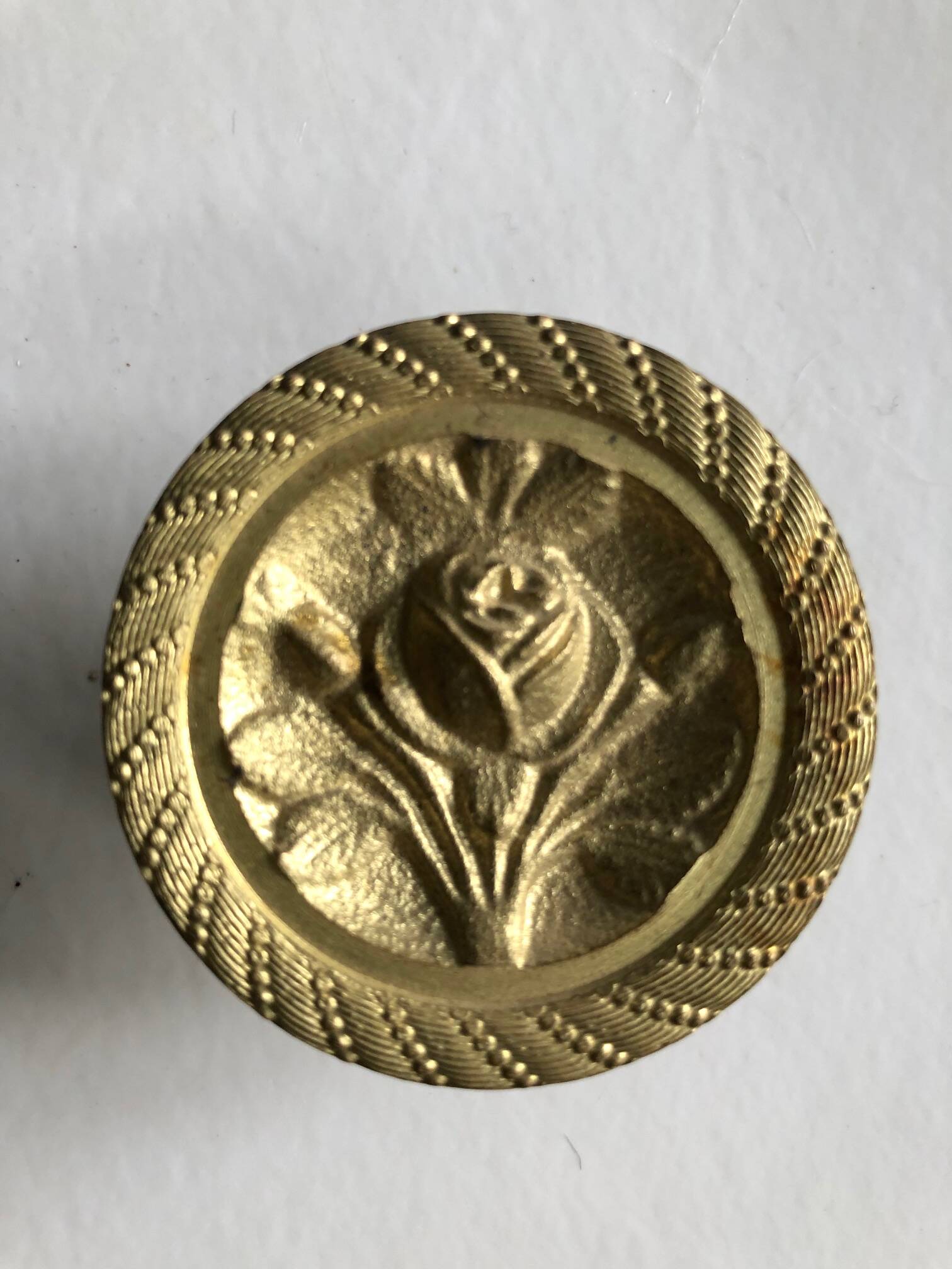 Large solid brass handle knob for door or furniture.