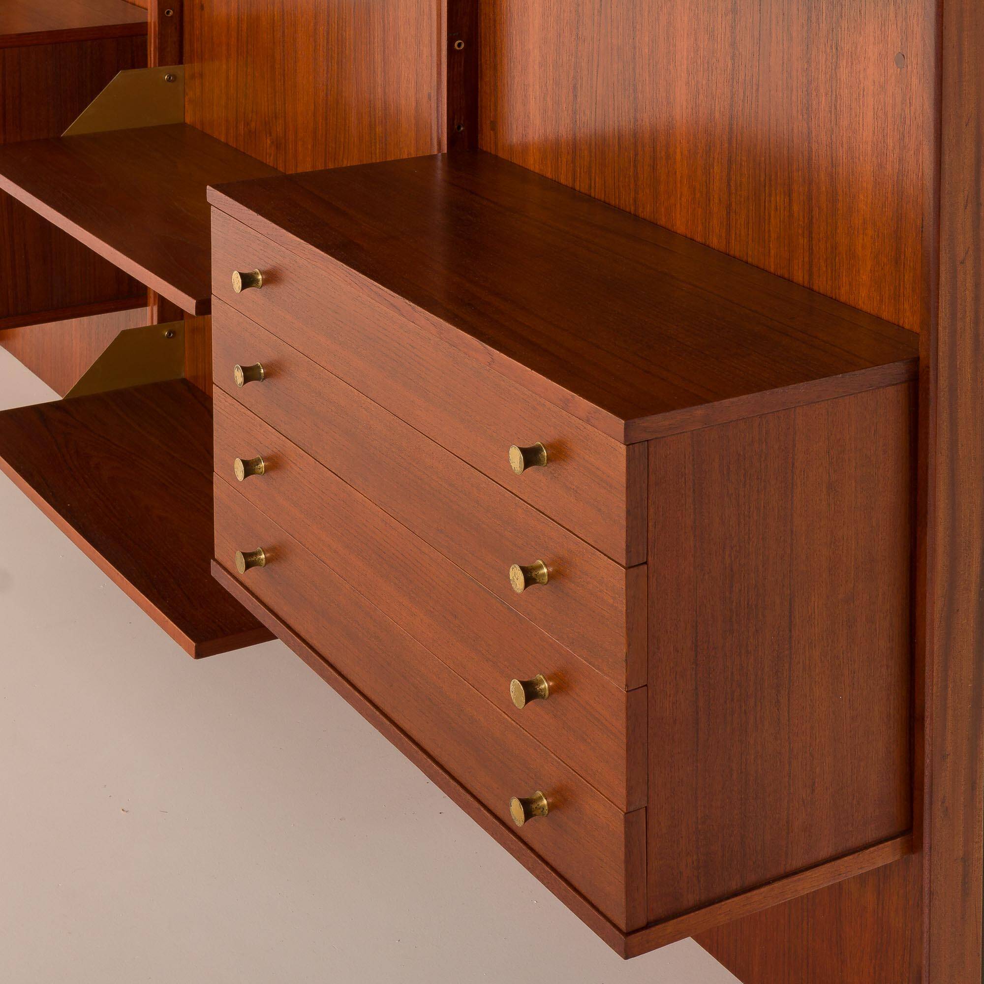 Italian mid-century teak wall unit on panels, 1970s