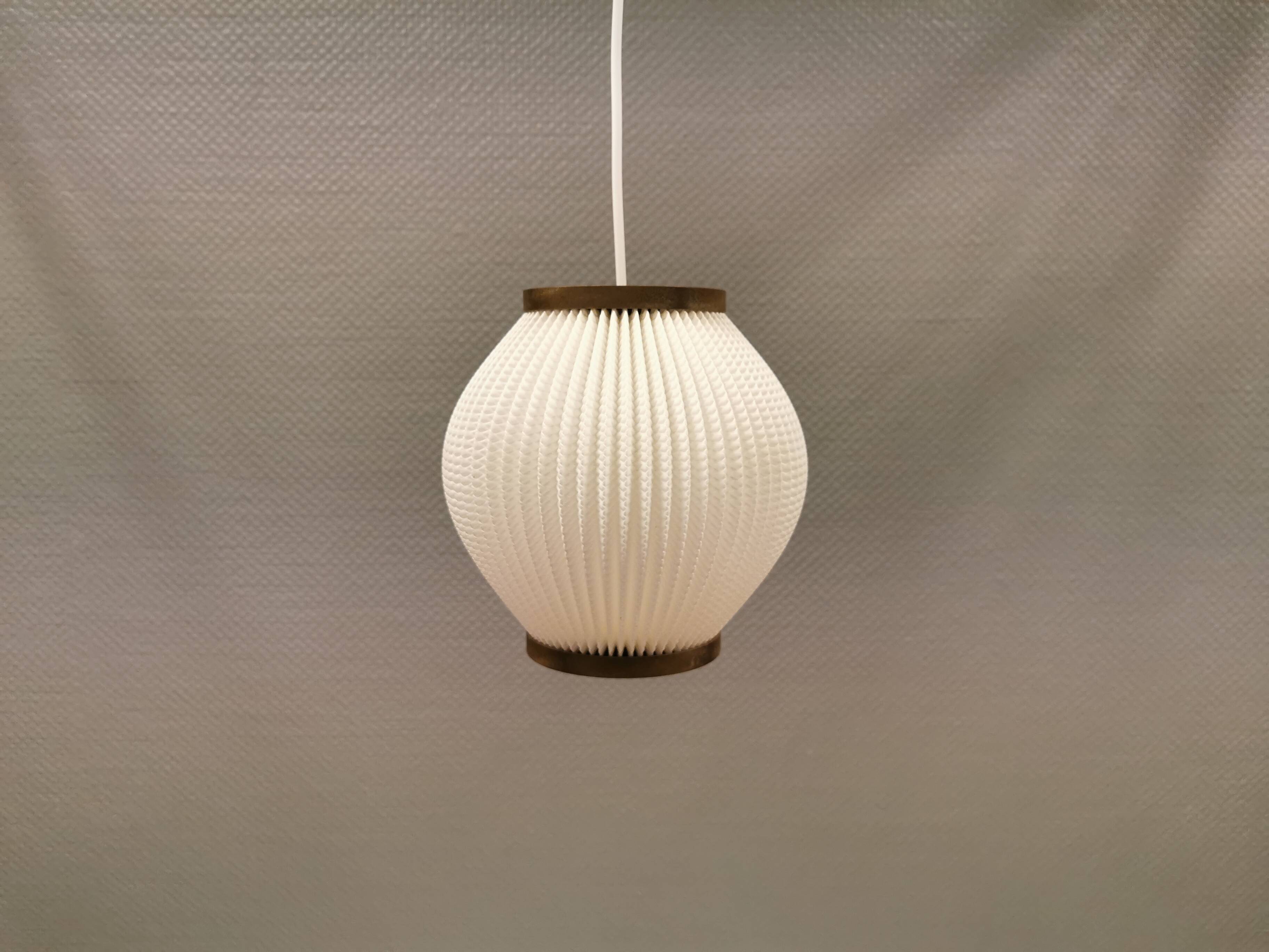 Pleated hanging lamp model Pearl Shade, produced by Hoyrup Light and designed by Lars E Schøiler