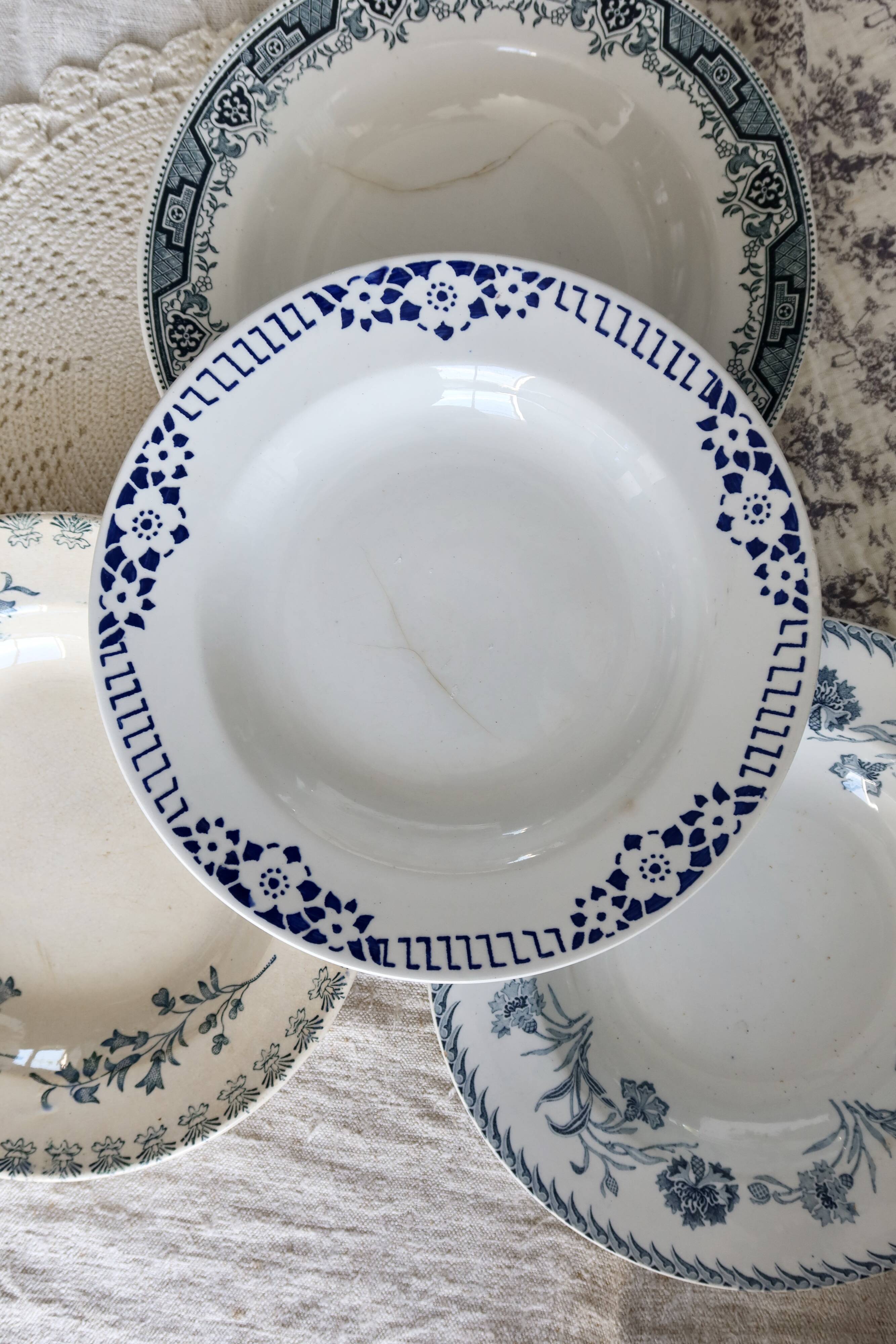 4 vintage blue ironstone soup plates