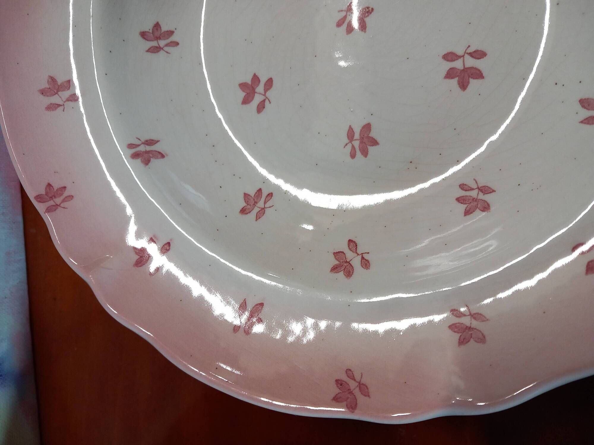 Set of 4 antique deep plates from St Amand in the "Vine Leaves" pattern.