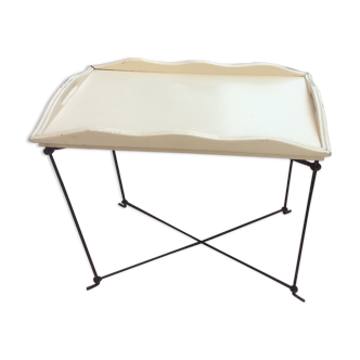 White wooden tray on black iron stand