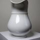 Antique white earthenware toilet jug from Pexonne, France