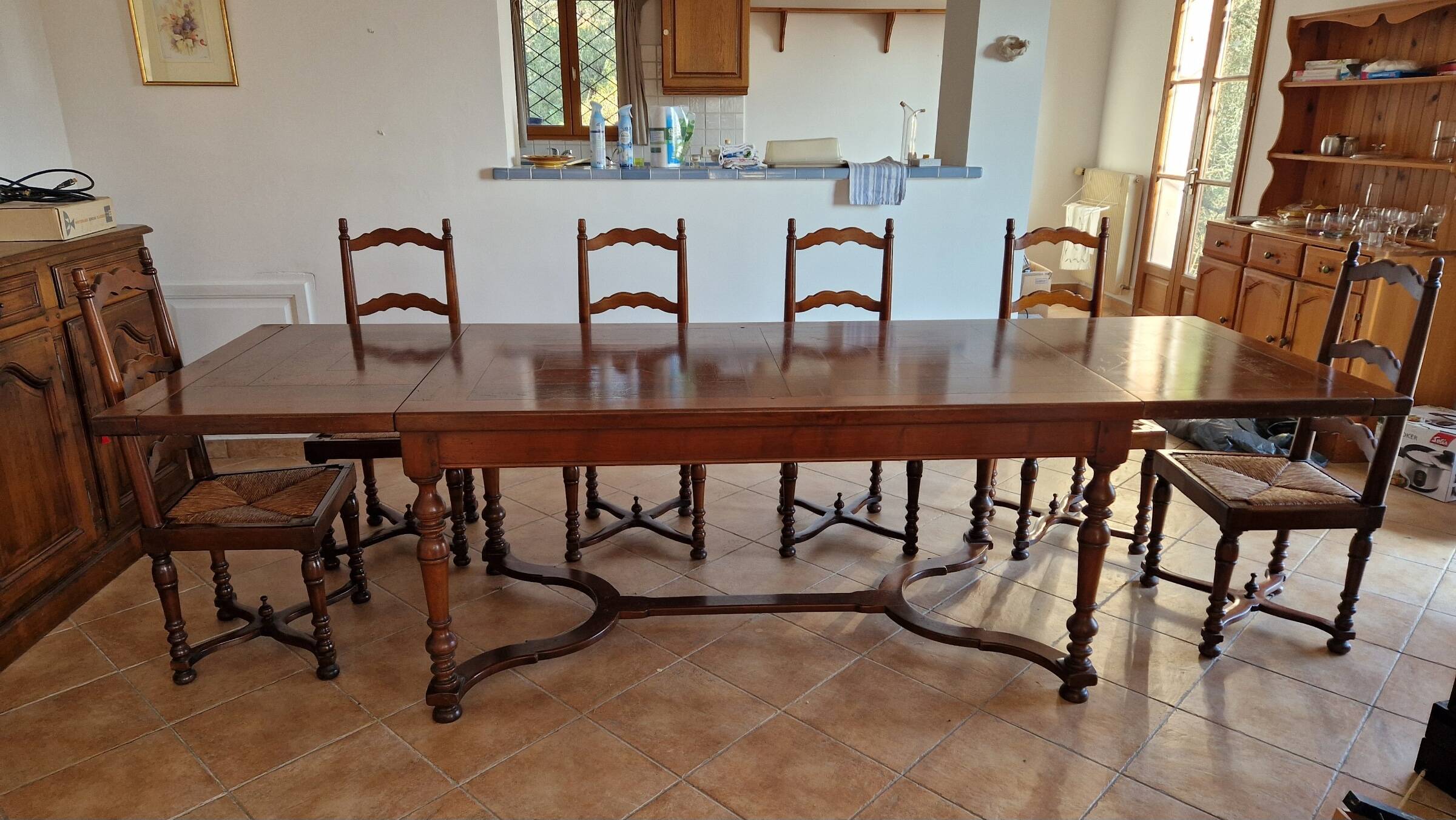 Marquetry wooden dining table with its 6 chairs.