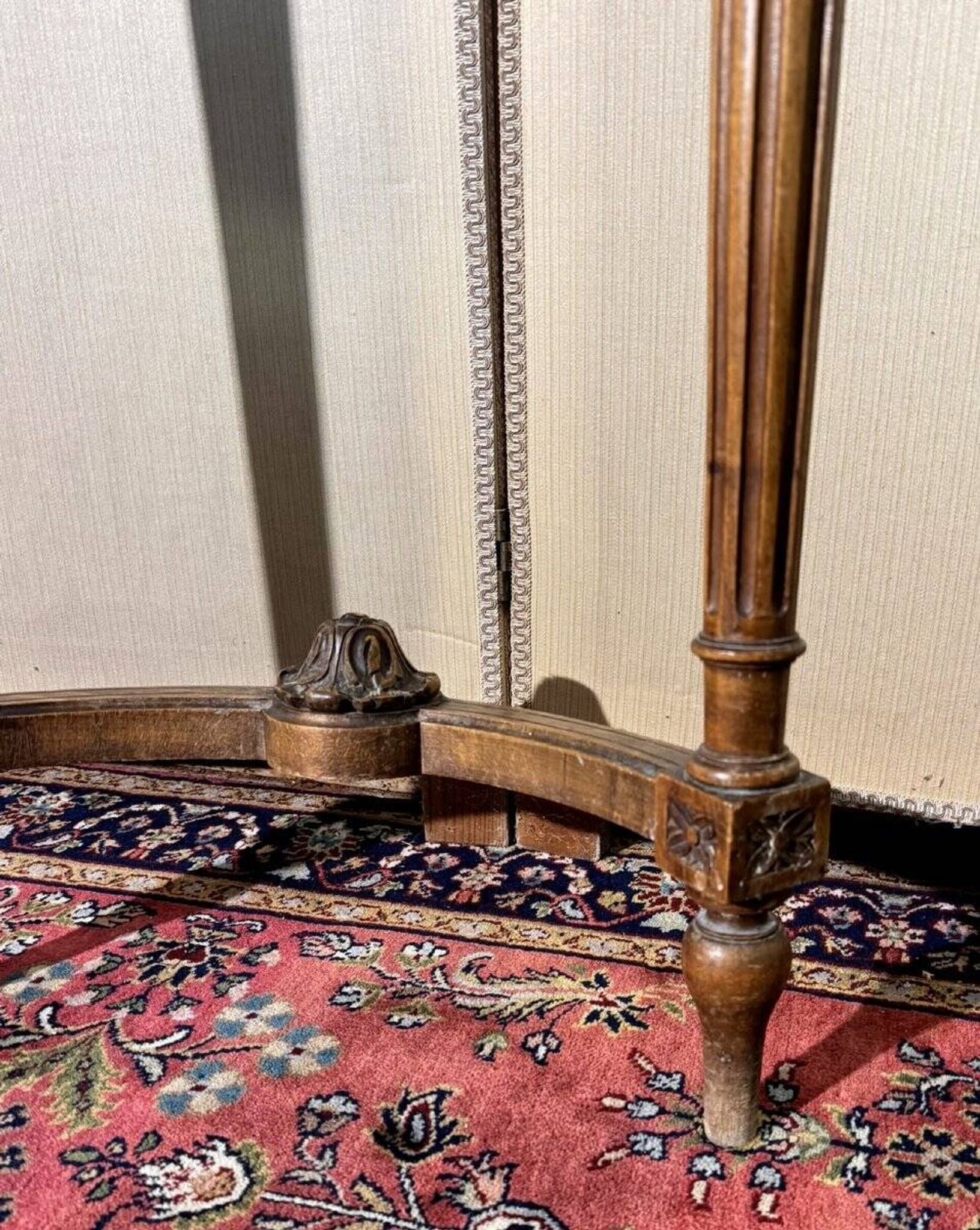 Half-moon console in Louis XVI style made of carved wood.
